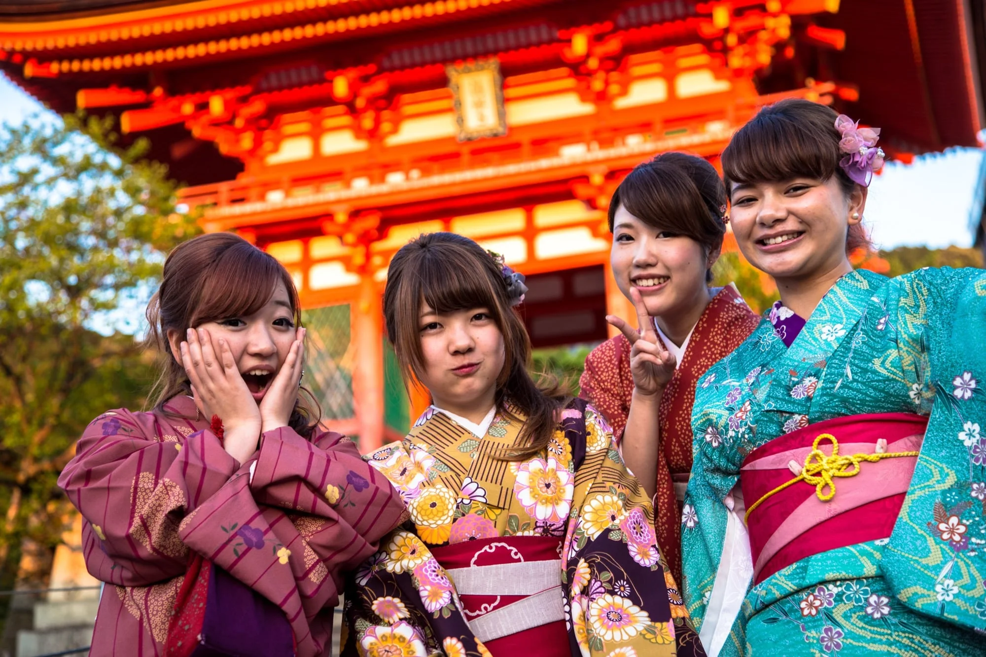 Background Image with 4 Asian Girls in front of pagoda